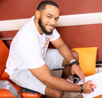 Student writing on some paper